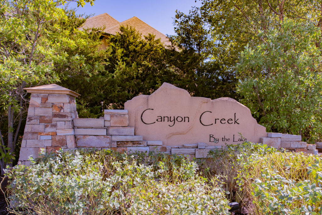 entry monument canyon creek by the lake