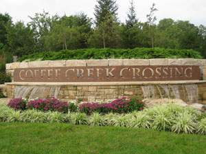 coffee creek crossing entry monument