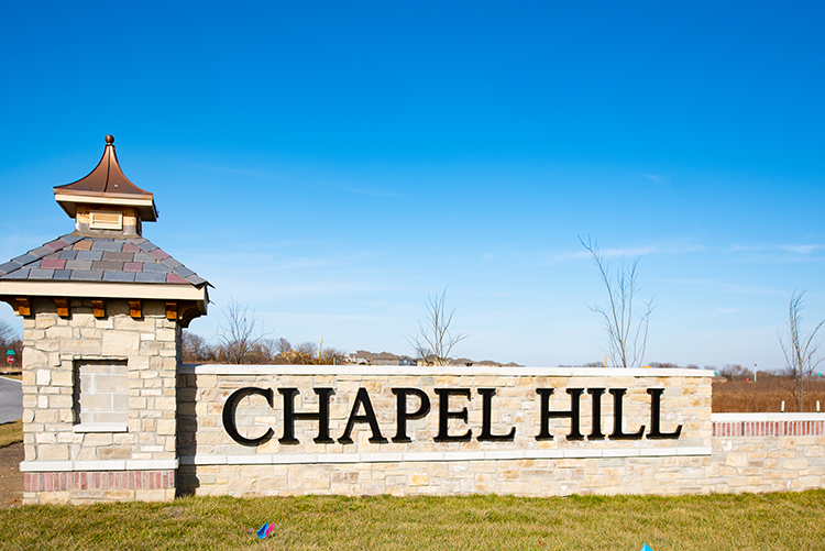 Chapel Hill entry monument photo by Ken Jansen Realtor