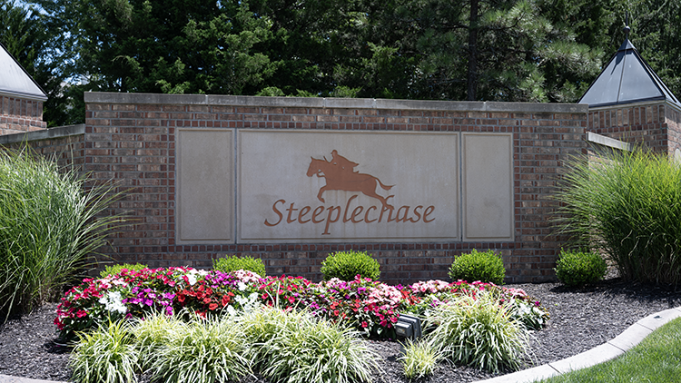 Steeplechase entry monument July 2026 photo by Ken Jansen Realtor